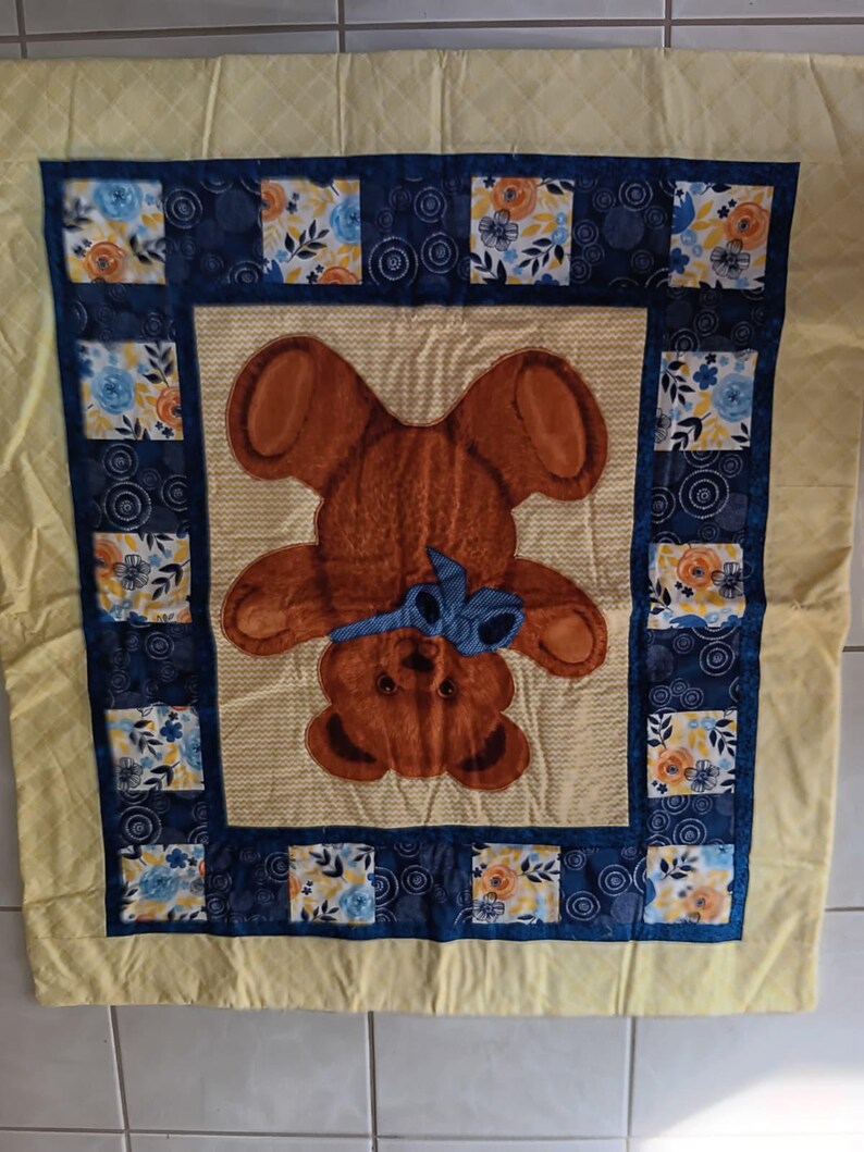 Bear quilt is 40 x 36 W