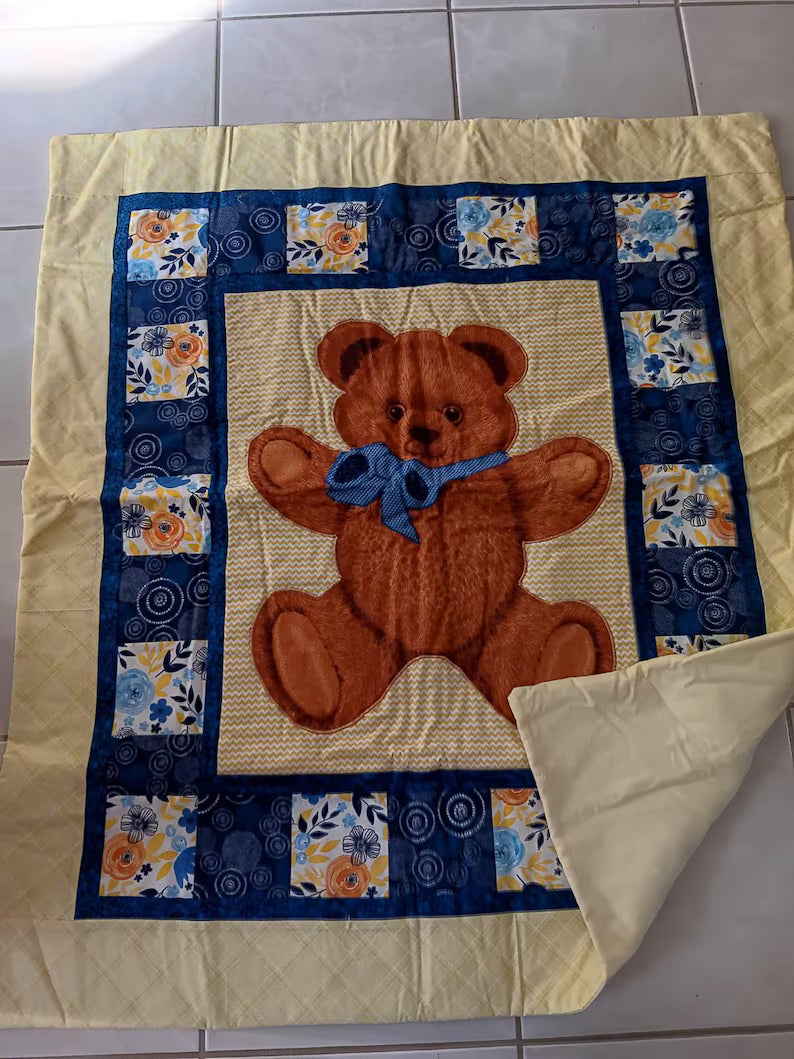 Bear quilt is 40 x 36 W